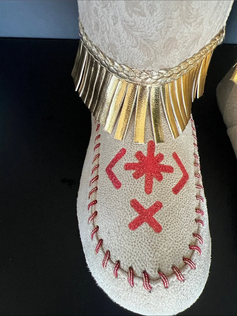 Disney Beige Moccasin Boots with Gold Fringe and Red Embroidery